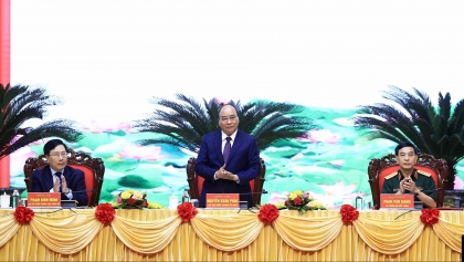 越南国家主席主持关于新形势下保卫祖国战略的决议实施10周年总结会议