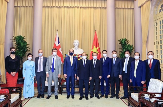 越南国家主席阮春福（右）会见英国外交部长多米尼克·拉布