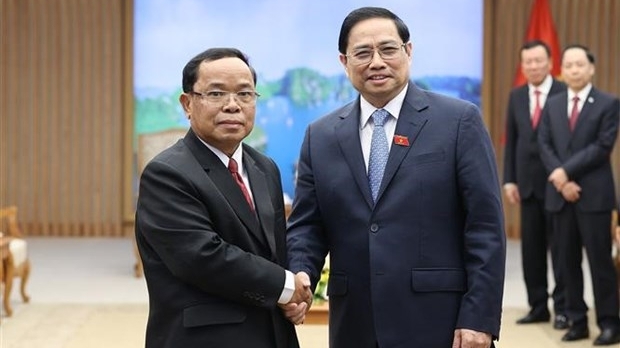 越南政府总理范明政会见老挝人民革命党中央检查委员会主任蓬马塔