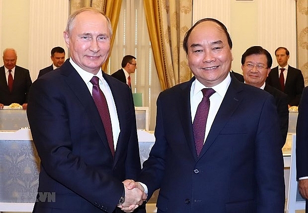 越南国家主席阮春福（右）与俄罗斯总统普京（图：越通社）