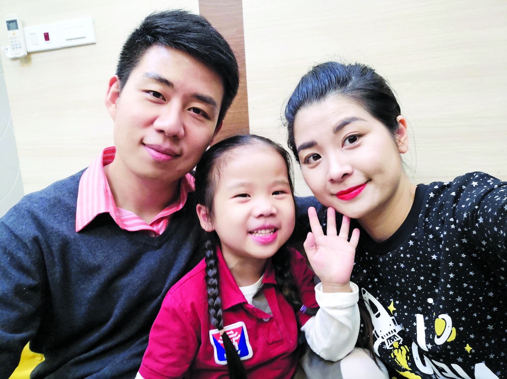 刘武晨、妻子和孩子。图自青年报