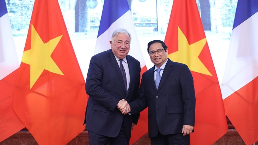 越南政府总理范明正会见法国参议院议长